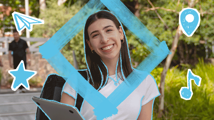 A smiling person stands outside with trees in background, wearing a white t-shirt and holding a laptop. A blue diamond shape frames their face. Floating icons like a paper airplane and location pin suggest exploration and pathways.
